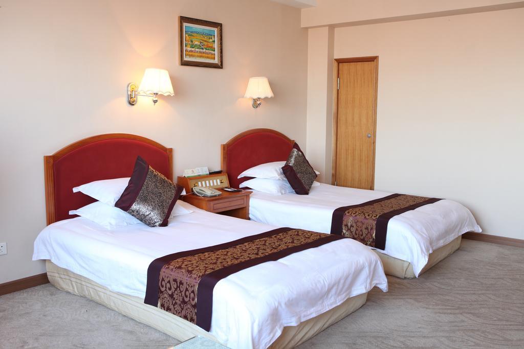 Tianhong Hotel Heze Ruang foto