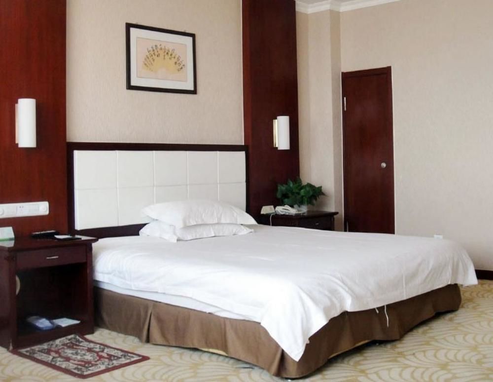 Tianhong Hotel Heze Bagian luar foto