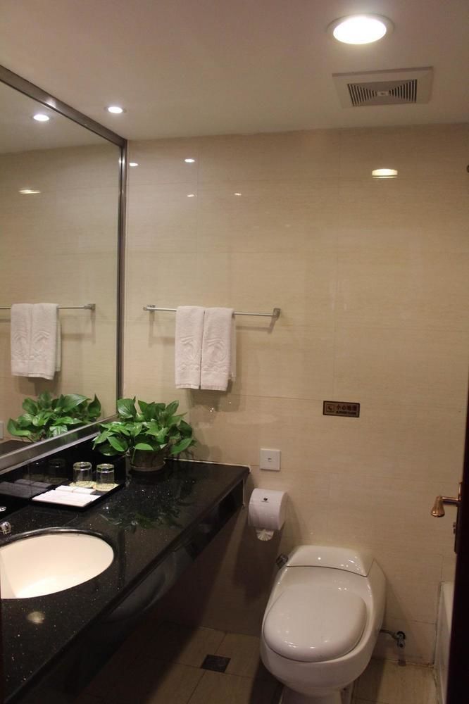 Tianhong Hotel Heze Bagian luar foto