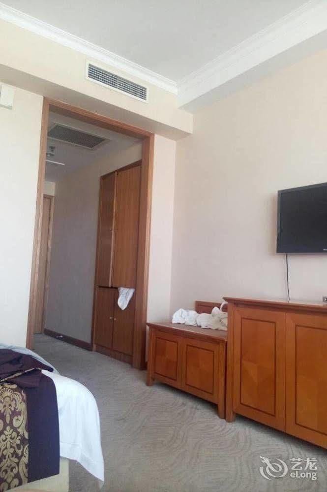 Tianhong Hotel Heze Bagian luar foto
