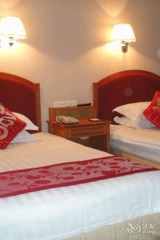 Tianhong Hotel Heze Bagian luar foto